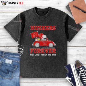 Alt Text: Hot Snoopy and Woodstock driving a car in Nebraska Huskers washed t-shirt, perfect for fans and casual wear.