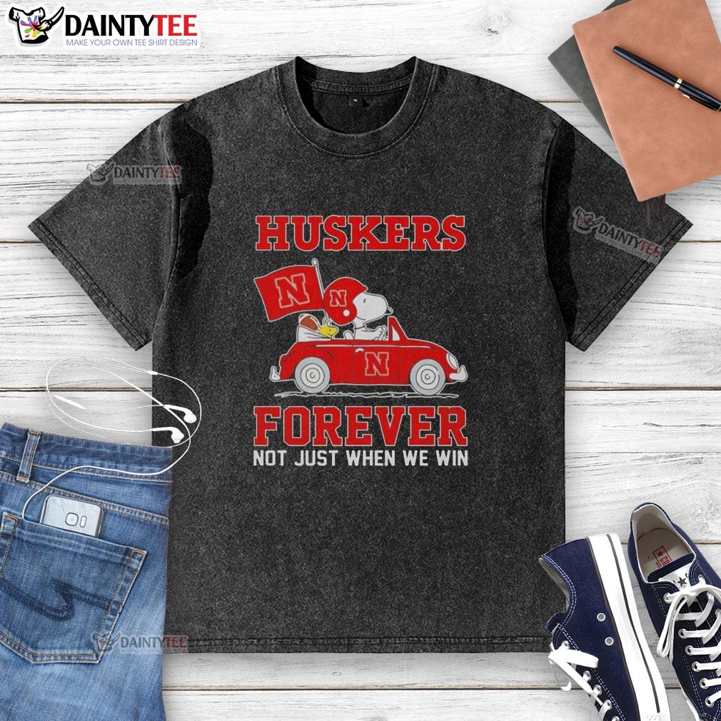 Alt Text: Hot Snoopy and Woodstock driving a car in Nebraska Huskers washed t-shirt, perfect for fans and casual wear.