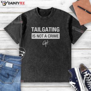 Hot Tailgating Is Not A Crime washed t-shirt featuring a fun slogan, perfect for sports fans and tailgating enthusiasts.