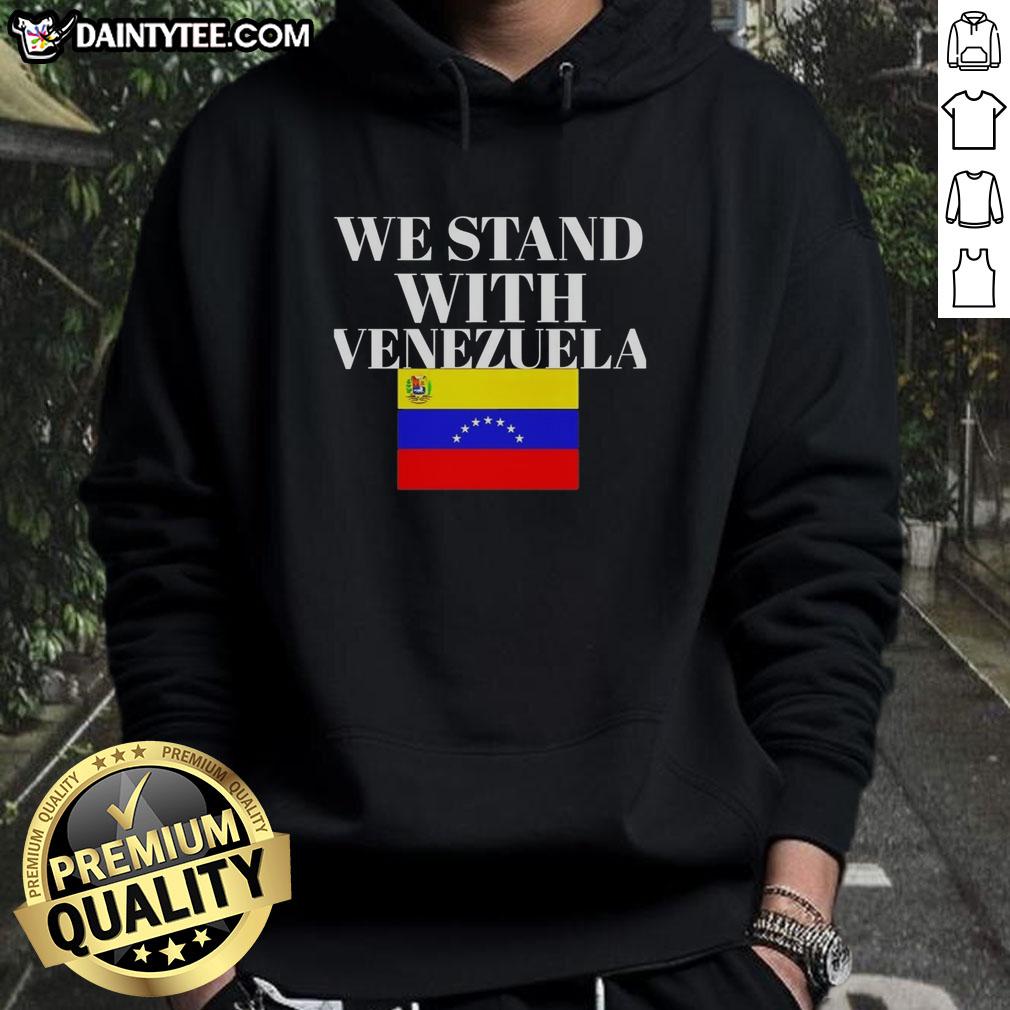 Person wearing a Hot We Stand With Venezuela Flag Hoodie, showcasing support for Venezuela with vibrant colors and bold design.