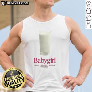Nice baby girl wearing a Kidman Dickinson Banderas tank top, showcasing a vibrant design and playful style.