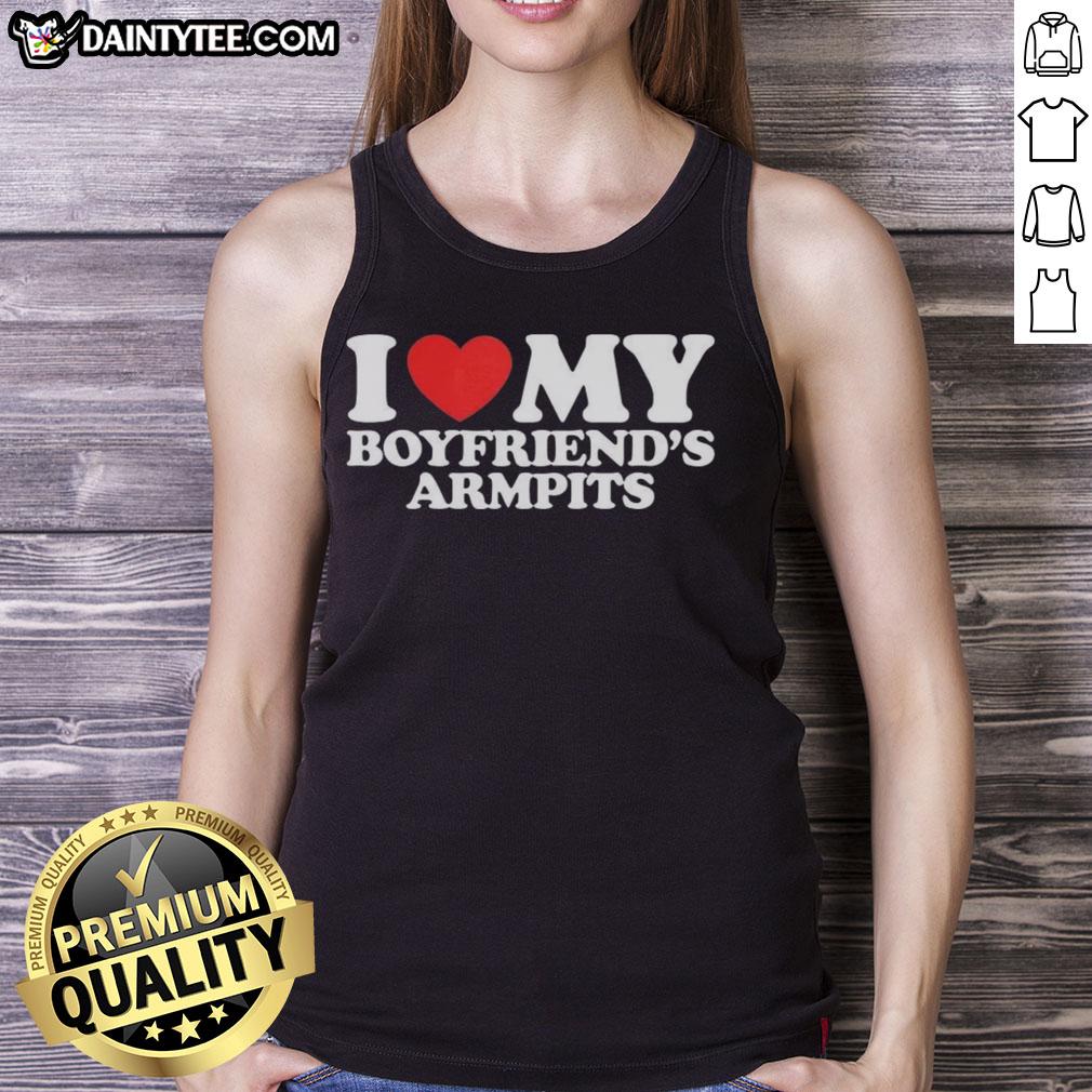 Woman wearing a 'Nice I Love My Boyfriend's Armpits' red heart tank top, showcasing a fun and playful fashion statement.