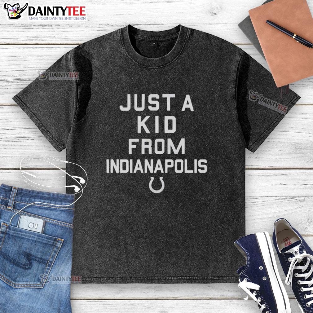 Alt Text: Nice Indianapolis Colts 'Just A Kid From Indianapolis' washed t-shirt displayed on a wooden background.