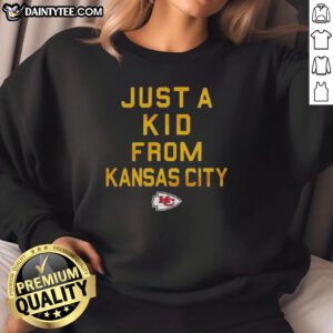 Nice Kansas City Chiefs 'Just A Kid From Kansas City' sweatshirt featuring vibrant team colors and logo, perfect for fans.