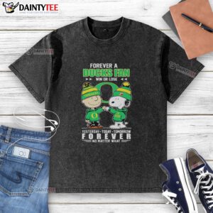 Alt Text: Snoopy and Charlie Brown graphic on a 'Forever a Ducks Fan' t-shirt, celebrating Oregon Ducks pride.
