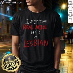 Alt Text: Funny I Met The Real Mike He's A Lesbian T-shirt design featuring bold text and vibrant colors on a casual shirt.