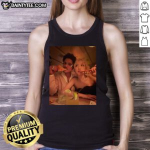 Bruno Mars enjoying pizza in a tank top at the 2026 Grammy Awards, radiating good vibes and style.