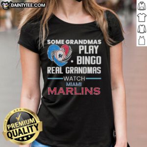 Grandmas enjoying bingo at a Miami Marlins game in a diamond heart-shaped ladies tee, celebrating fun moments.