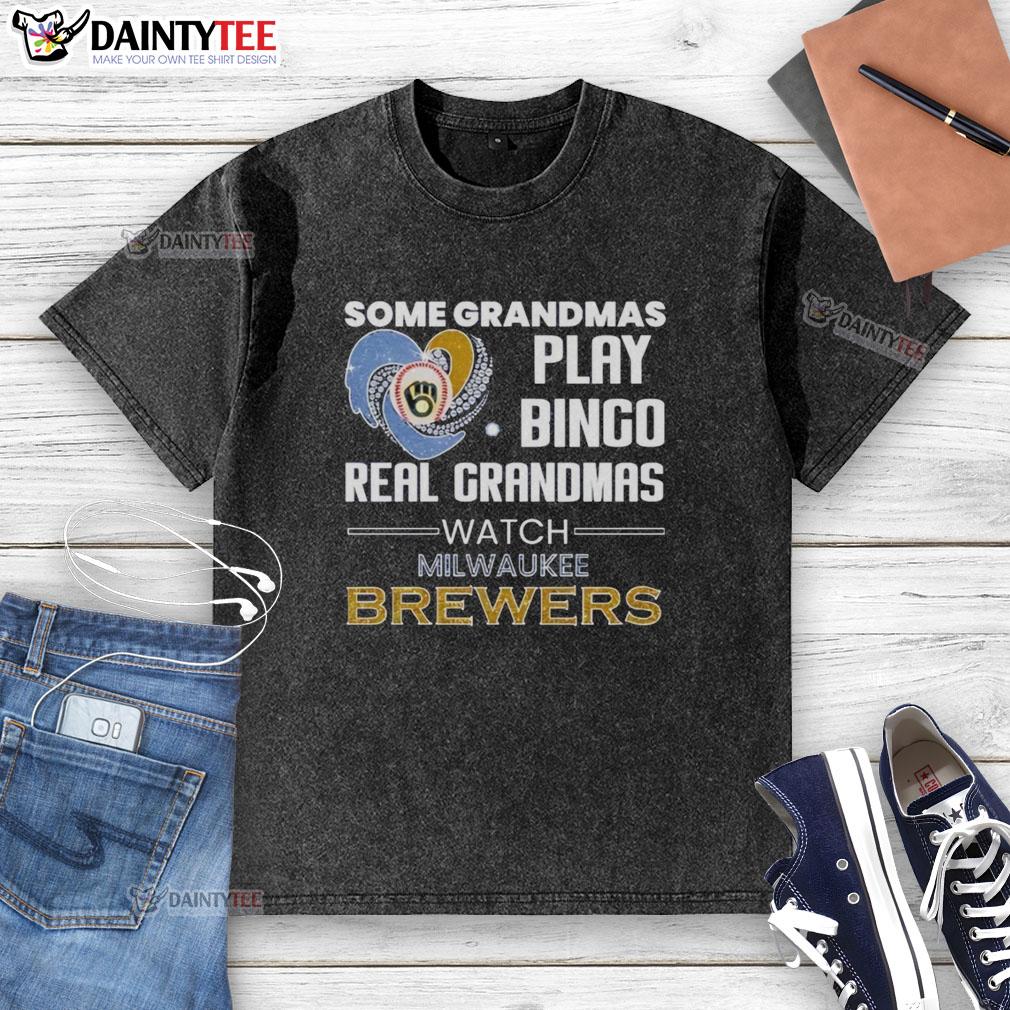 Grandmas enjoying bingo while wearing a Milwaukee Brewers heart-shaped t-shirt in a cozy setting.