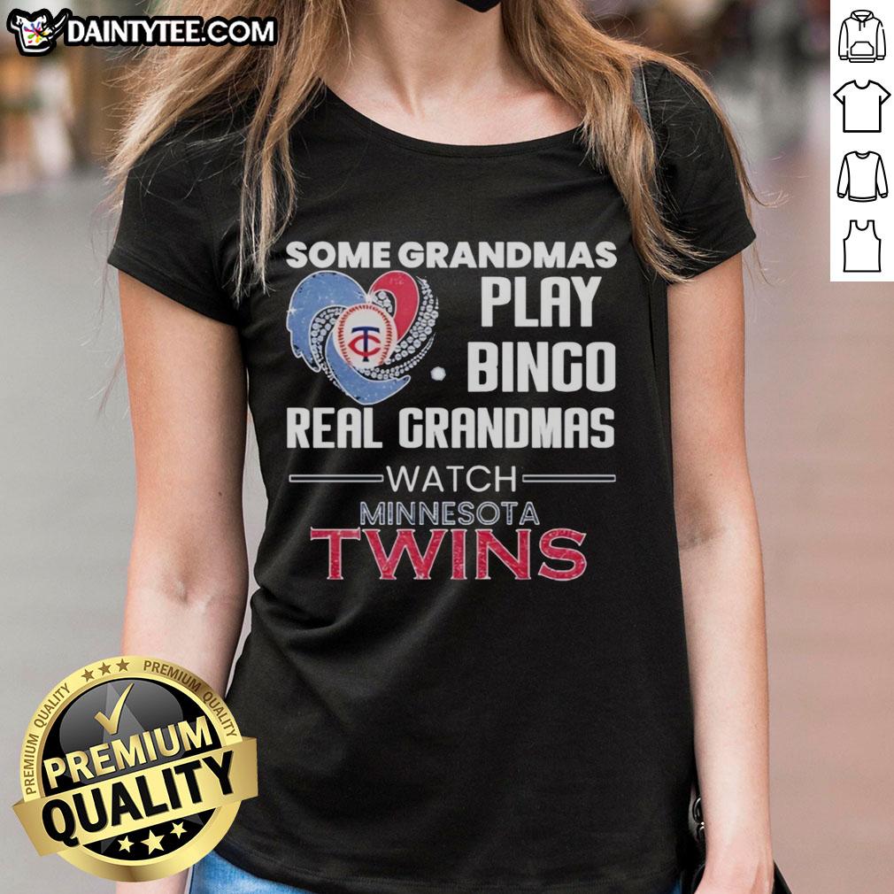 Grandmas enjoying bingo at a Minnesota Twins game, wearing a heart-shaped tee celebrating real grandmas' love for baseball.