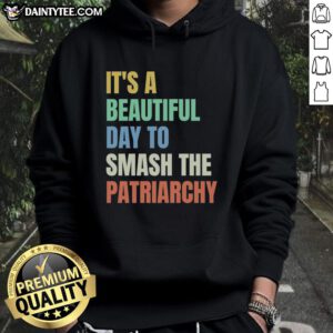 Colorful rainbow hoodie with the phrase 'It's a Beautiful Day to Destroy the Patriarchy' promoting empowerment.