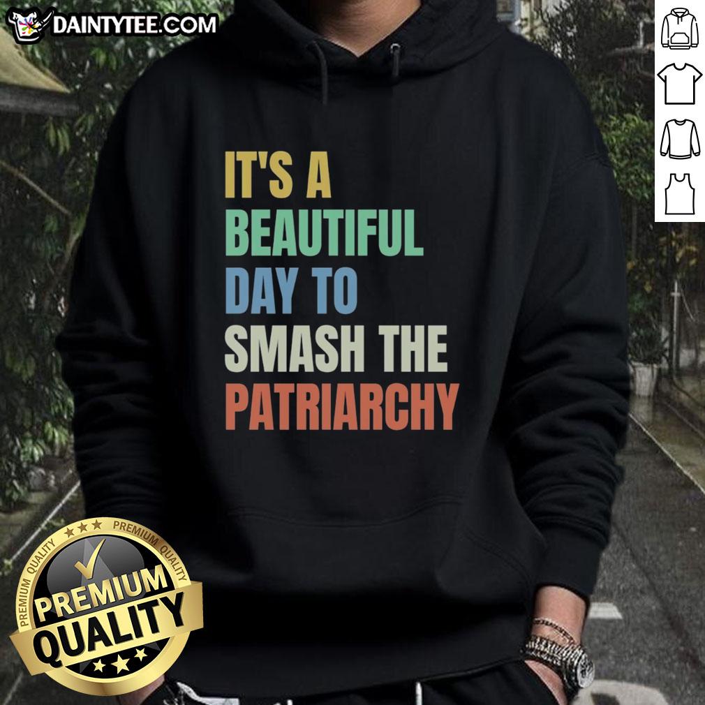 Colorful rainbow hoodie with the phrase 'It's a Beautiful Day to Destroy the Patriarchy' promoting empowerment.