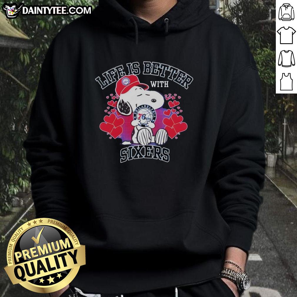 Snoopy wearing a Philadelphia 76ers hoodie with 'Life Is Better With Sixers' slogan, showcasing team spirit.