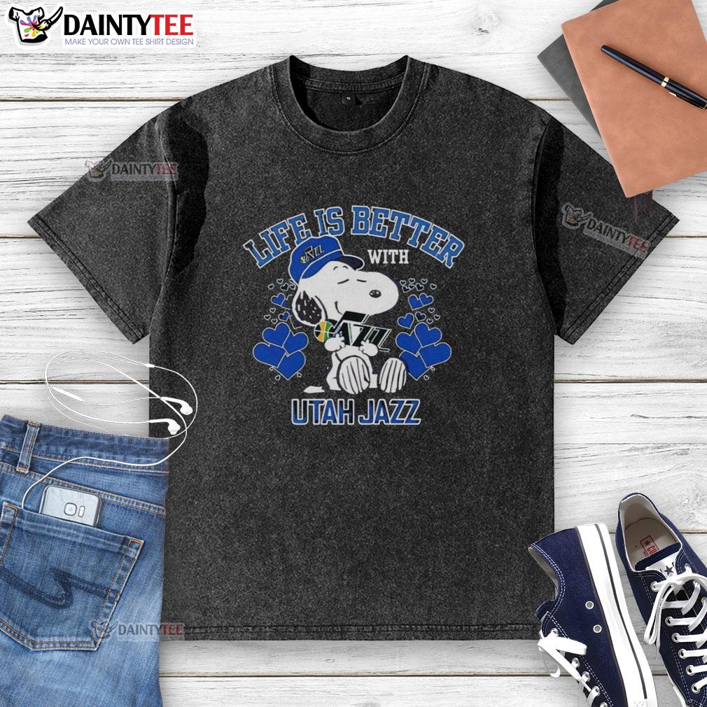 Alt Text: Snoopy wearing a Utah Jazz Warriors logo t-shirt with Life Is Better With Utah Jazz slogan, showcasing fan spirit.