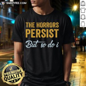 Alt Text: Awesome The Horrors Persist But So Do I rebooted and functional T-shirt featuring a bold graphic design.