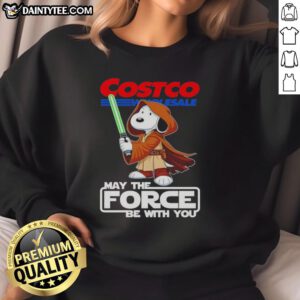 Alt Text: Cute Snoopy sweatshirt from Costco Wholesale featuring 'May The Force Be With You' design for fans and collectors.