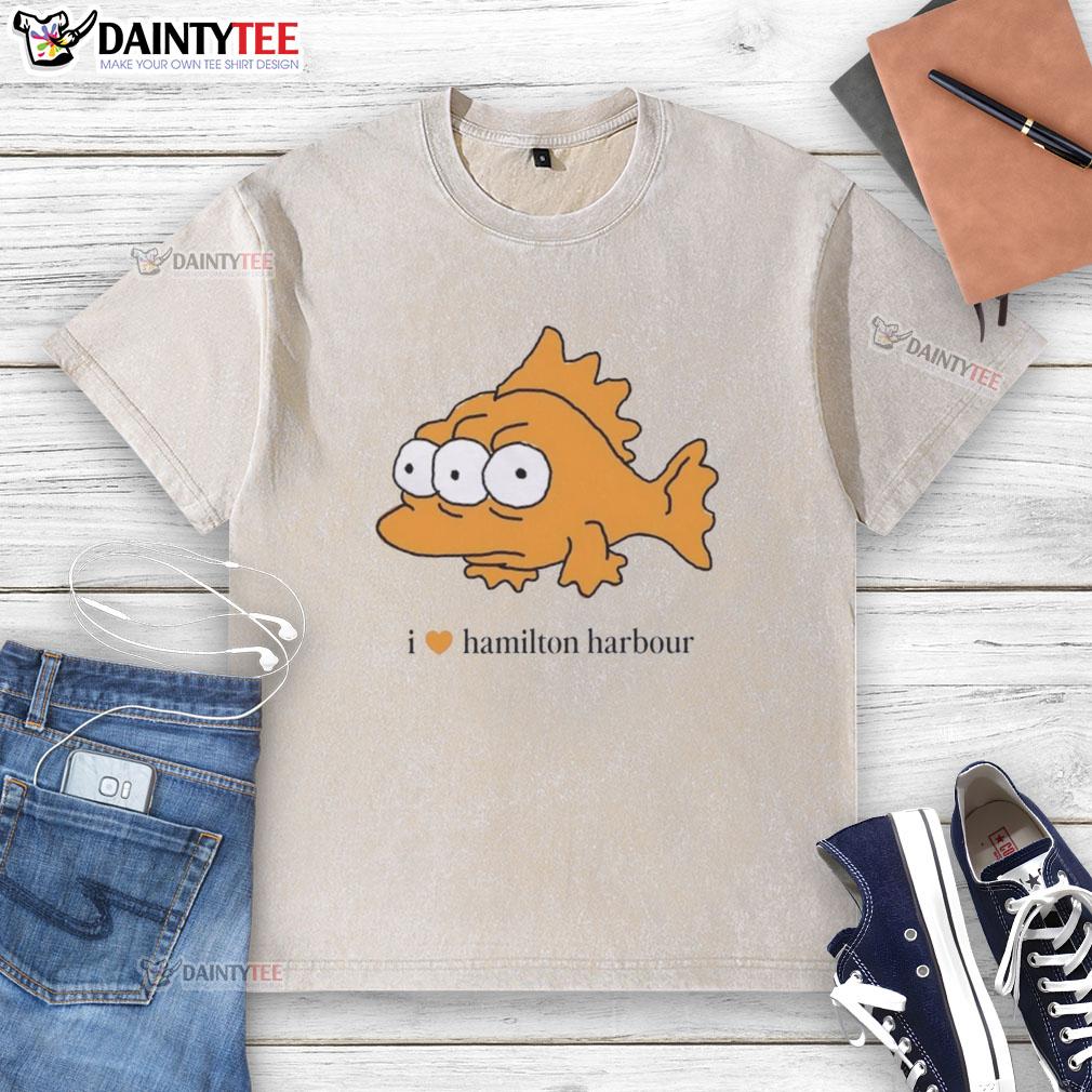 Good I Love Hamilton Harbour washed t-shirt displayed on a wooden background, showcasing its vibrant color and relaxed fit.