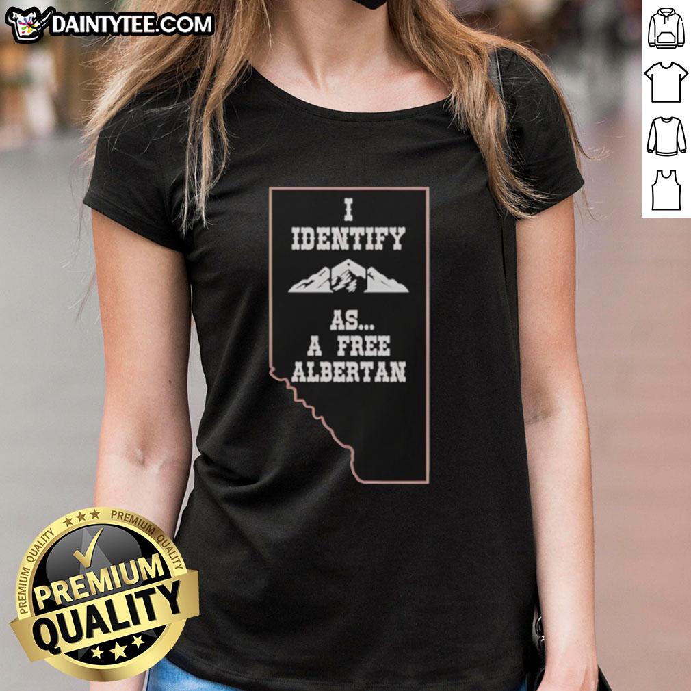 Ladies tee featuring 'I Identify As A Free Albertan' design with Alberta mountains, perfect for proud Albertans.