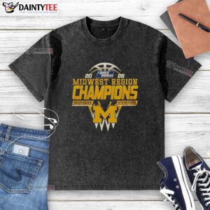 2026 Midwest Region Champions Nice Michigan Wolverines washed t-shirt featuring team logo and vintage style design.