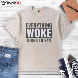 Alt Text: Original Everything Woke Turns to Sht Washed T-Shirt in casual style, featuring a bold graphic design on a light background.