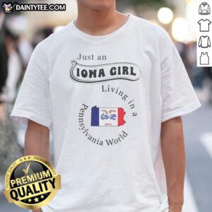 Funny Just An Iowa Girl Living In A Pennsylvania World Graphic Shirt displayed on a casual background
