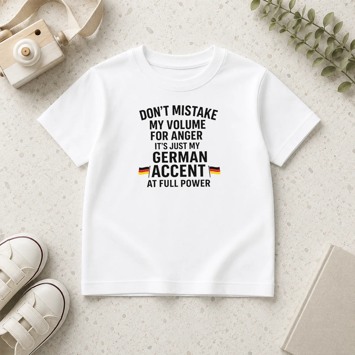 Nice Dont Mistake My Volume For Anger Its Just My German Accent At Full Power kids t shirt with bold text print