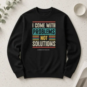 Official I Come With Problems Not Solutions long sleeve shirt in black with white text design, front view