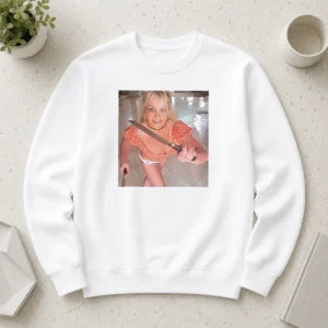 Premium Britney Spears Butcher Baby Knife Dance sweater in black with bold graphic print and crew neck design