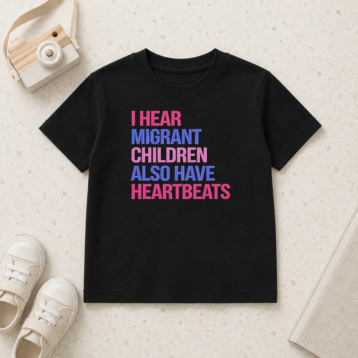 Good I Hear Migrant Children Also Have Heartbeats Bold Statement Text Kids T-Shirt