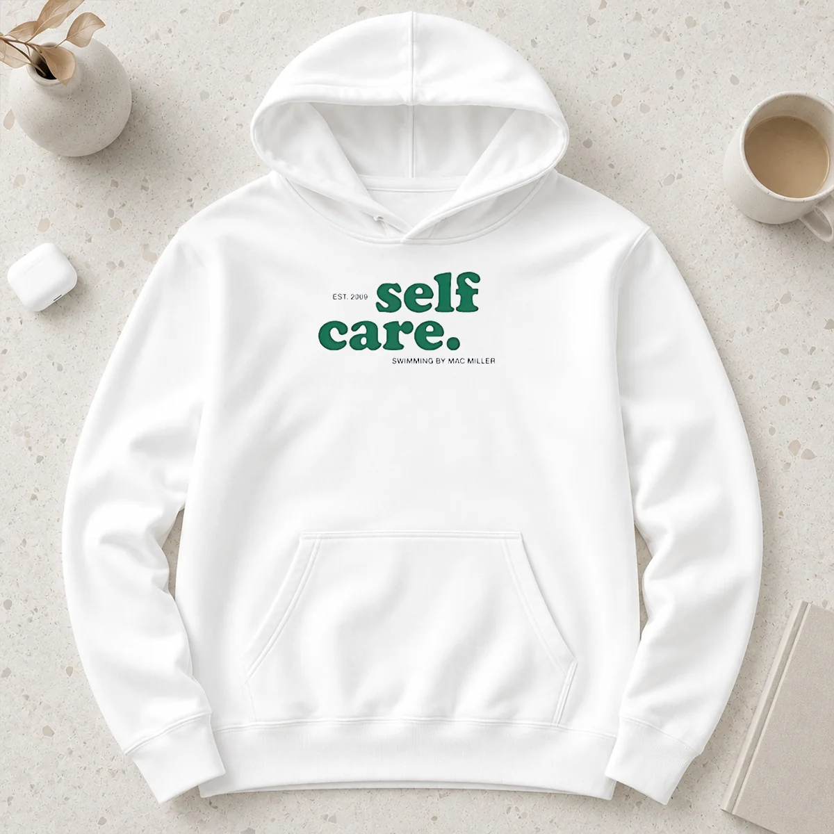 Original Self Care EST 2009 Swimming By Mac Miller Hoodie in black, front view with graphic print