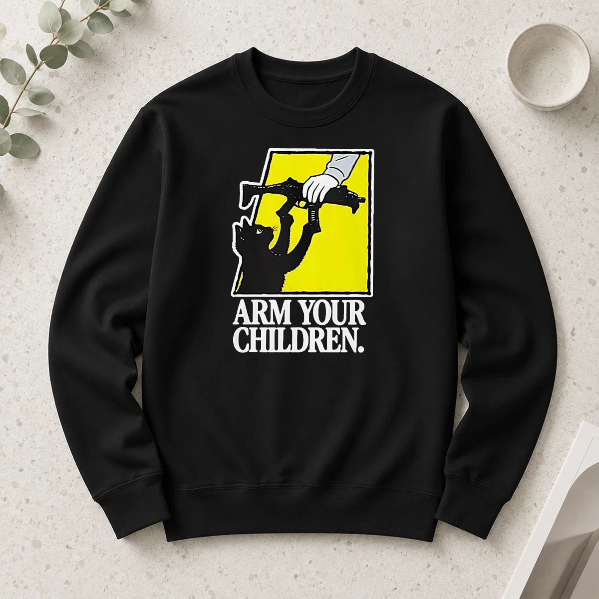 Pretty Black Cat With Gun Satire Arm Your Children long sleeve shirt featuring bold graphic print on black fabric