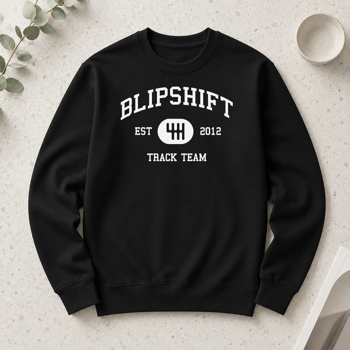 Top Awesome Blipshift Track Team Est 2012 long sleeve shirt in dark color with bold graphic print