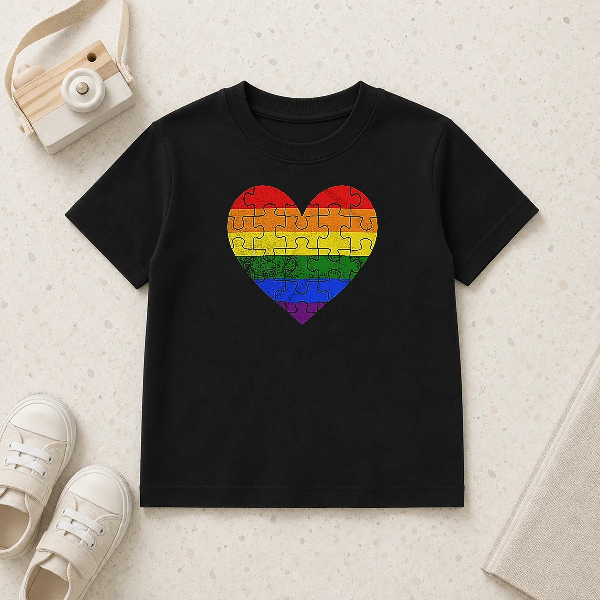 Top Homosexual Love Rainbow Heart Puzzle Kids T Shirt featuring a colorful heart puzzle design on a comfortable kids' tee